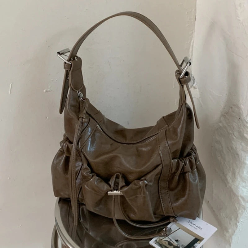Vintage Soft Pu Leather Motorcycle-style Shoulder Bag for Women 2026 New Trendy Ruffled Drawstring Commute Underarm Bag Female